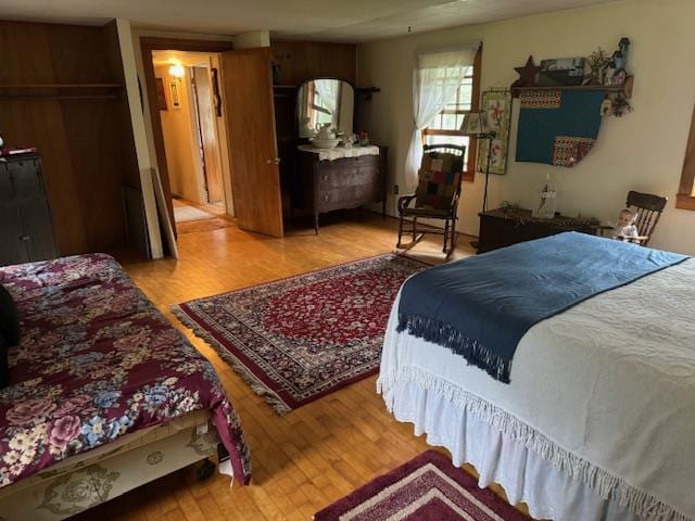 bedroom with wood-type flooring