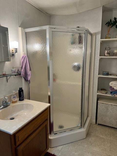 bathroom with vanity and walk in shower