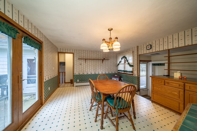 dining room with a chandelier