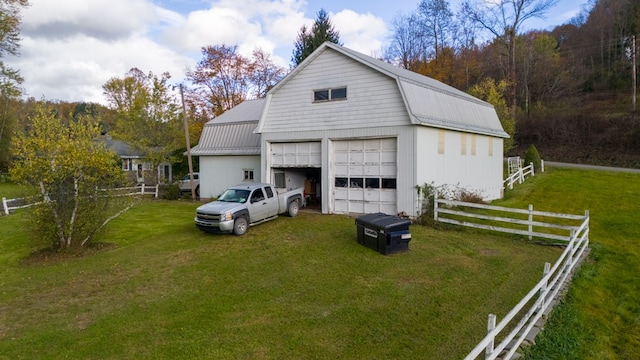 garage with a lawn