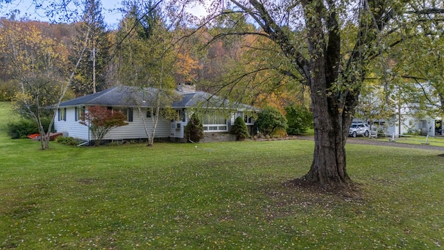 view of front of house featuring a front yard