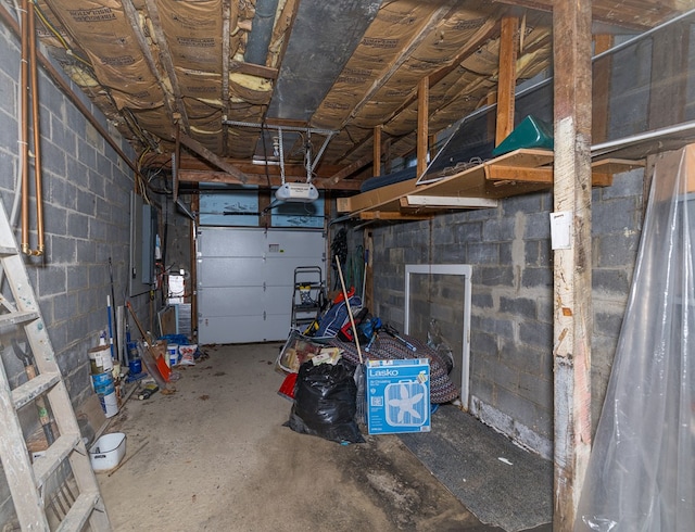 garage with concrete block wall