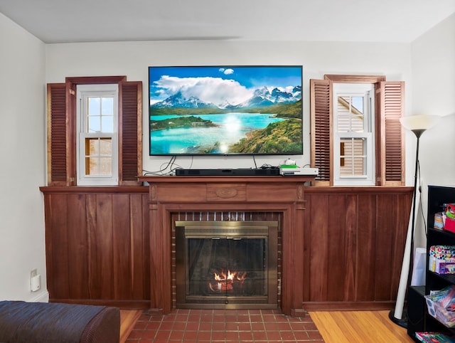 living room with a fireplace with flush hearth