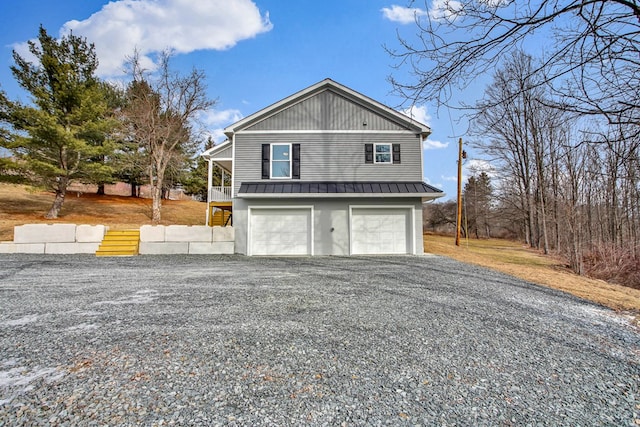 view of side of home featuring a garage