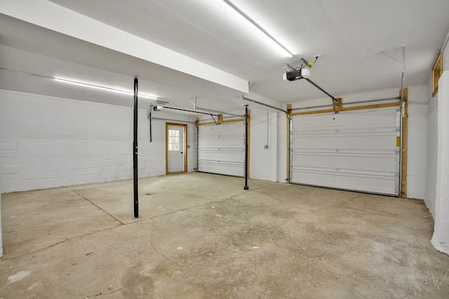 garage featuring a garage door opener