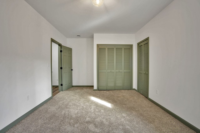 unfurnished bedroom with carpet floors