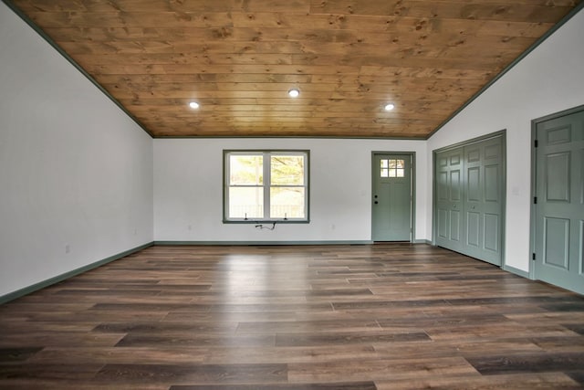 interior space with dark wood-type flooring, wood ceiling, and lofted ceiling