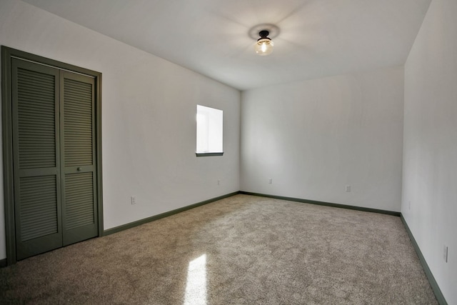 unfurnished bedroom with a closet