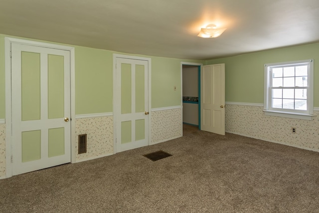 unfurnished bedroom featuring carpet flooring