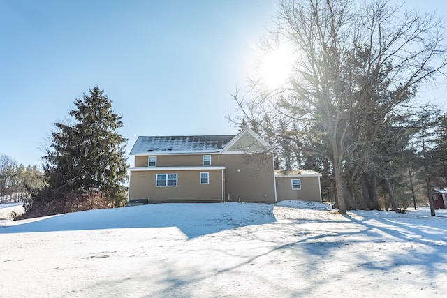 view of snow covered property