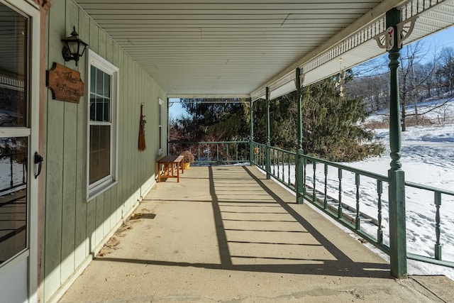 view of snow covered patio