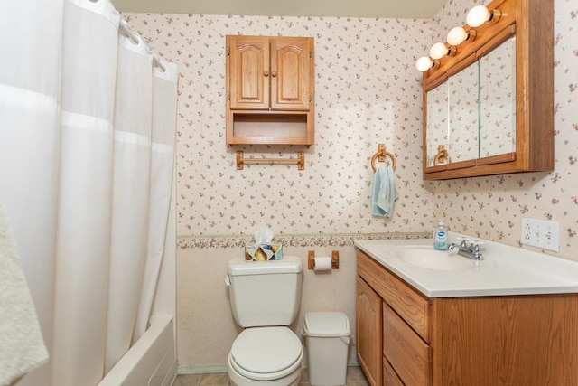 full bathroom with shower / bathtub combination with curtain, vanity, and toilet