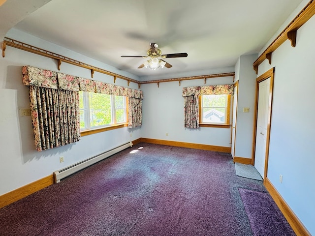 10 Ward Ave, Towanda, PA 18848 - carpeted empty room with baseboard heating, healthy amount of natural light, ceiling fan, and baseboards