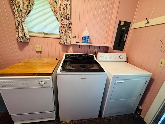 10 Ward Ave, Towanda, PA 18848 - laundry room featuring washer and dryer and wood walls