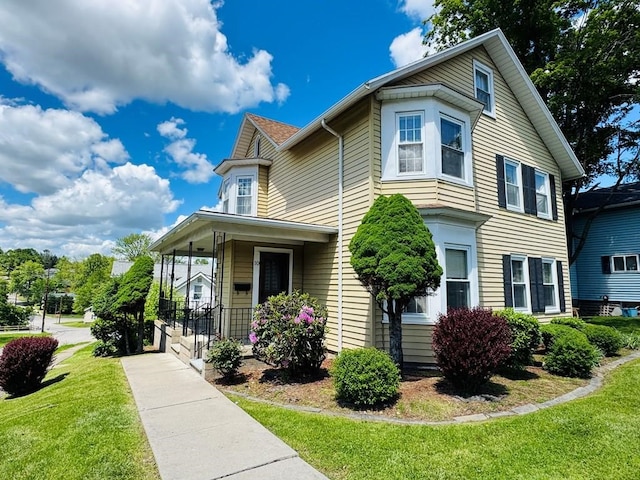 10 Ward Ave, Towanda, PA 18848 - view of front of house with a front yard and a porch