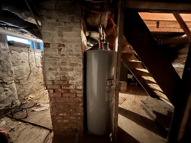 utility room with water heater