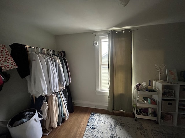 spacious closet featuring wood finished floors