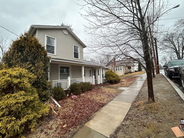 view of home's exterior with a porch