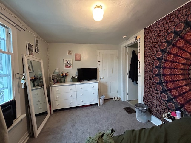 bedroom featuring visible vents and carpet floors