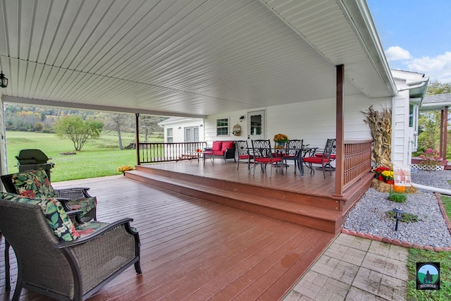 deck featuring a lawn