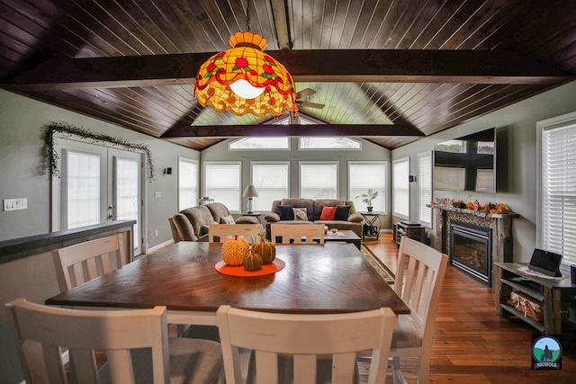 dining space with vaulted ceiling with beams, ceiling fan, wooden ceiling, and hardwood / wood-style flooring