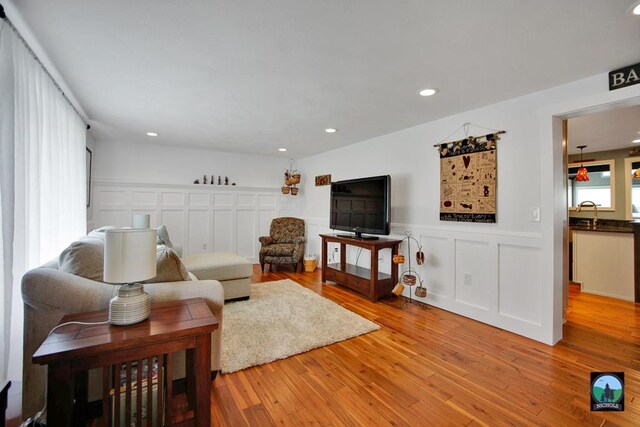 living room with light hardwood / wood-style floors