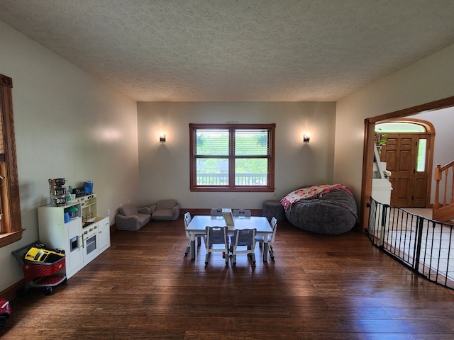 82 Cherry Tree Ln, Coudersport, PA 16915 - dining space featuring hardwood / wood-style flooring and a textured ceiling
