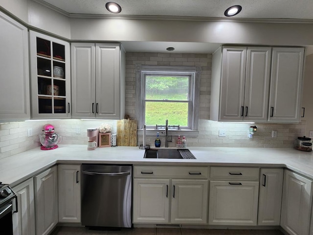 82 Cherry Tree Ln, Coudersport, PA 16915 - kitchen with dishwasher, a sink, white cabinetry, decorative backsplash, and ornamental molding