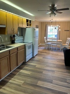 32 Investment Ln, Milan, PA 18831 - kitchen with white electric range oven, ceiling fan, wood finished floors, and light countertops