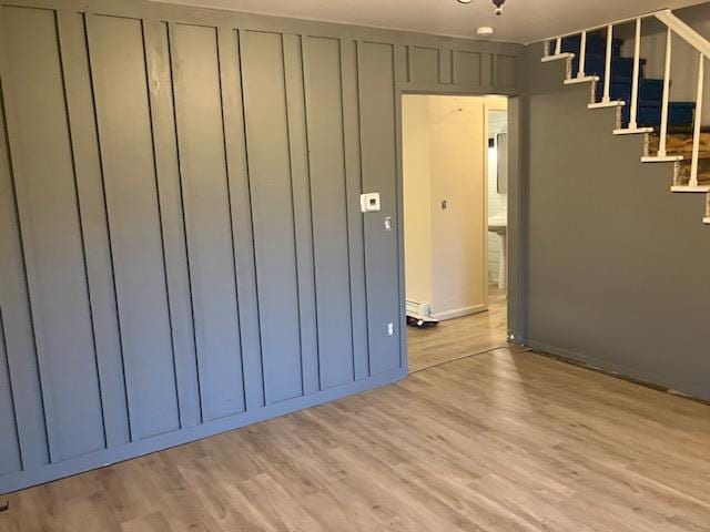 32 Investment Ln, Milan, PA 18831 - unfurnished room featuring light wood-style flooring and stairs