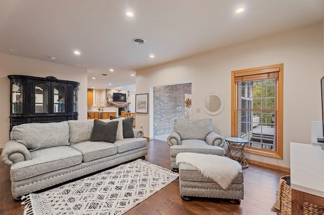 living room featuring dark wood-type flooring