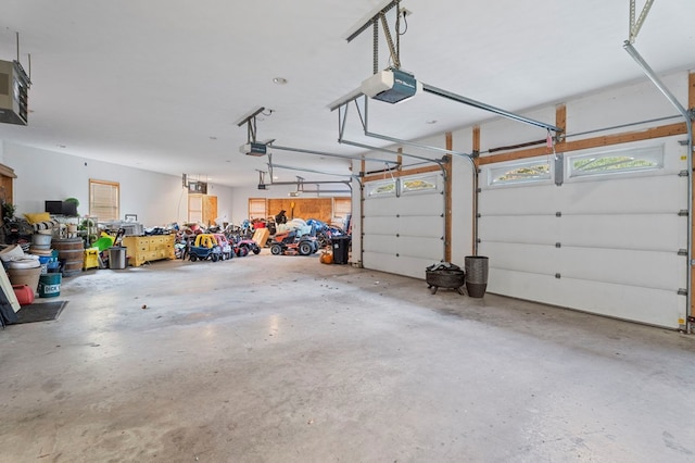 garage featuring a garage door opener