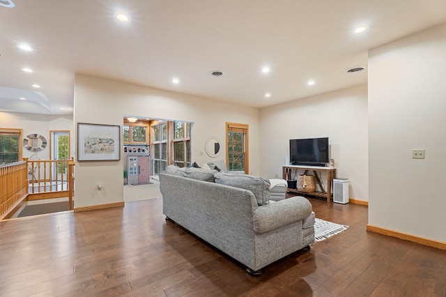 living room featuring dark hardwood / wood-style floors