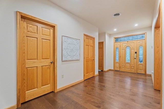 foyer entrance with hardwood / wood-style flooring