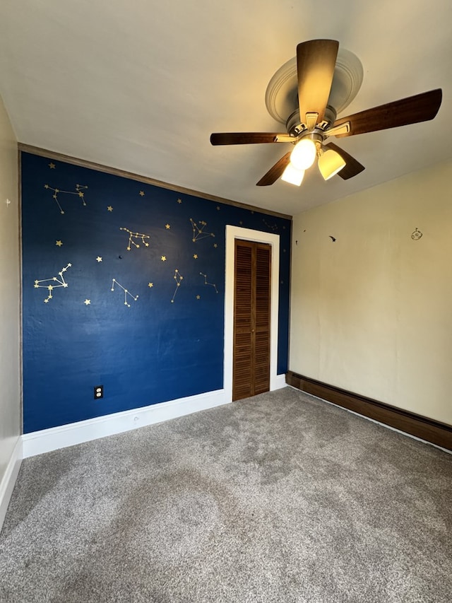 519 N Elk Ave, Kane, PA 16735 - carpeted empty room with baseboards and a ceiling fan