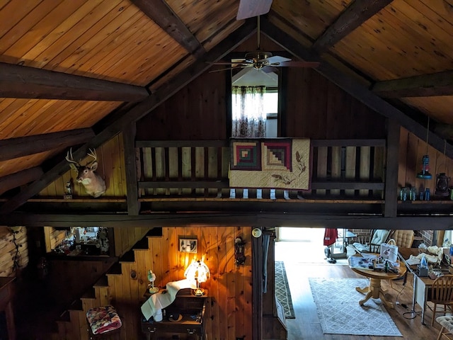 153 Pinneo Hill Rd, Oswayo, PA 16915 - detailed view of wood ceiling with exposed beams, wood finished floors, wood walls, and a ceiling fan