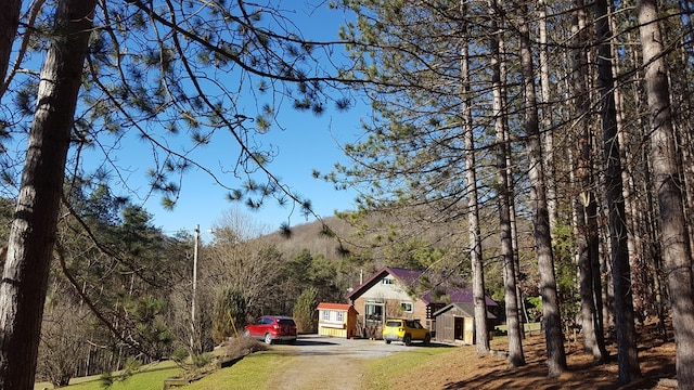153 Pinneo Hill Rd, Oswayo, PA 16915 - view of front of property with dirt driveway and a front lawn