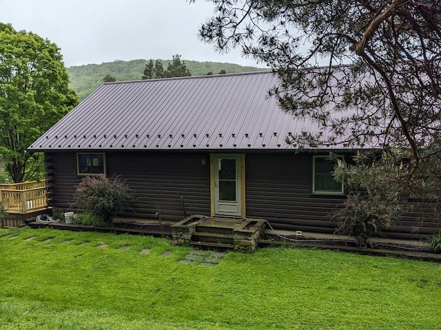 153 Pinneo Hill Rd, Oswayo, PA 16915 - back of house featuring a yard, metal roof, and a deck