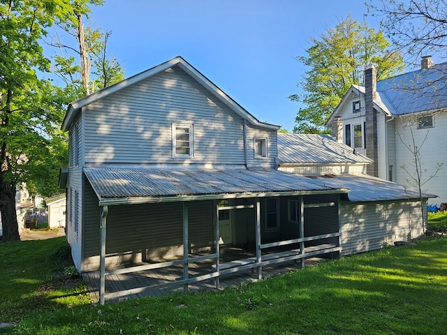 202 Cliff St, Montrose, PA 18810 - rear view of property featuring a lawn and metal roof