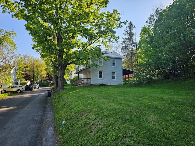 202 Cliff St, Montrose, PA 18810 - view of side of home with a yard and metal roof