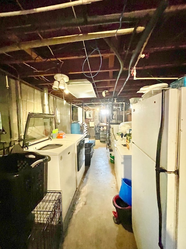 403 Horse Thief Run Rd, Wellsboro, PA 16901 - unfinished below grade area featuring washer and clothes dryer and freestanding refrigerator