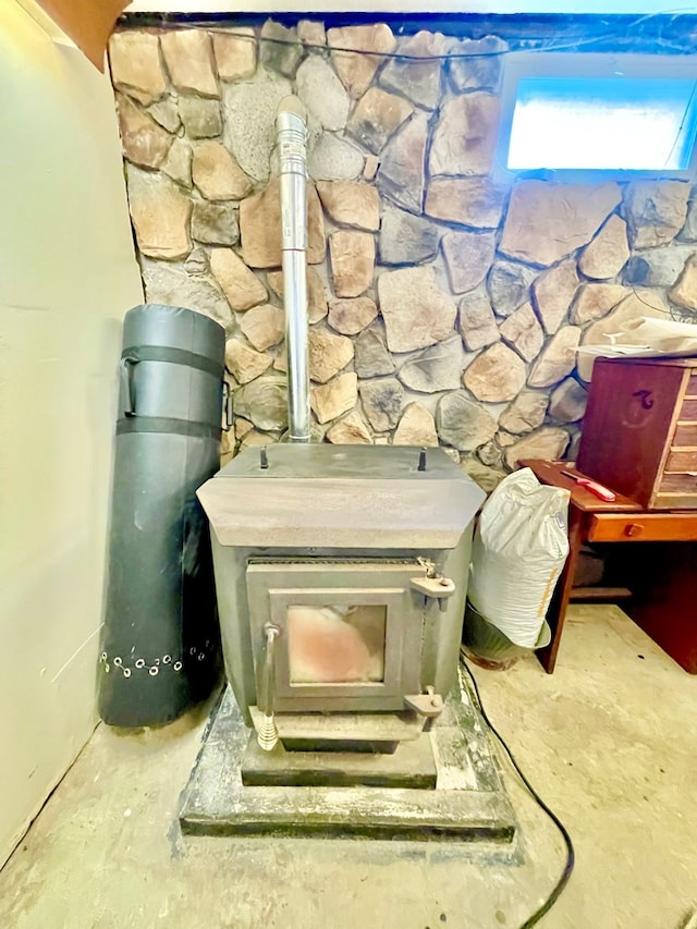403 Horse Thief Run Rd, Wellsboro, PA 16901 - detailed view of a wood stove and unfinished concrete floors