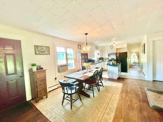 403 Horse Thief Run Rd, Wellsboro, PA 16901 - dining room with baseboard heating, light wood-style floors, and cooling unit