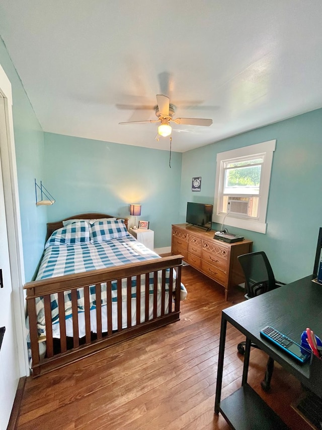 403 Horse Thief Run Rd, Wellsboro, PA 16901 - bedroom with wood-type flooring, a desk, a ceiling fan, and cooling unit