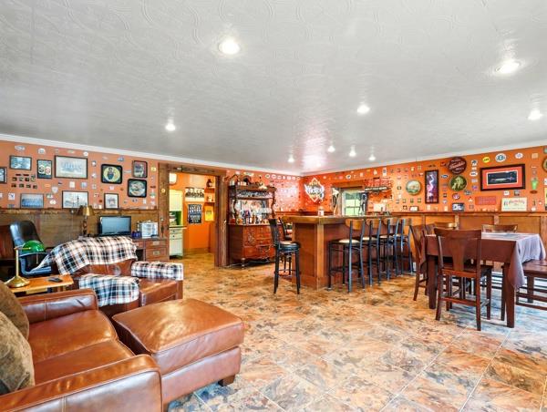 175 Rte 467, Wysox, PA 18854 - living room featuring bar, crown molding, and recessed lighting