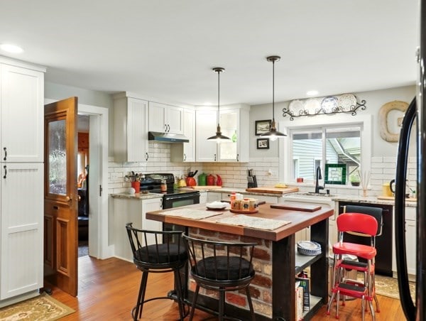 175 Rte 467, Wysox, PA 18854 - kitchen featuring black / electric stove, light countertops, backsplash, wood finished floors, and recessed lighting