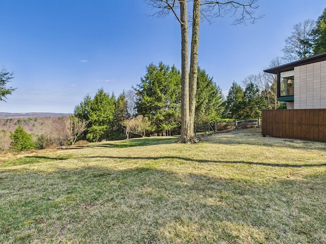 view of yard with fence