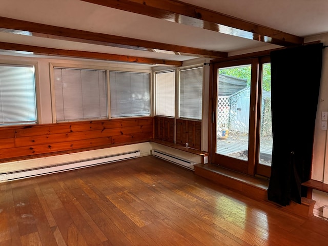 unfurnished sunroom featuring beamed ceiling