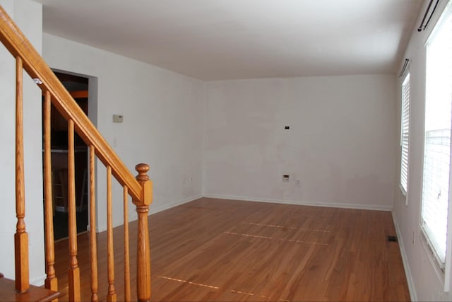 empty room featuring hardwood / wood-style flooring