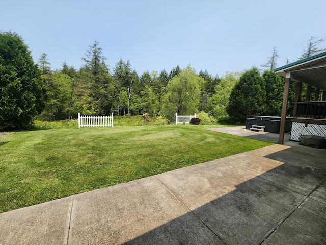 151 Ice Mine Rd, Coudersport, PA 16915 - view of yard featuring a hot tub, a patio, and a wooded view
